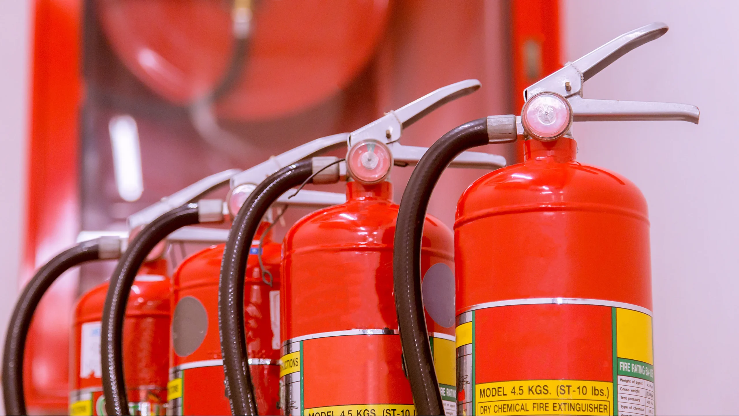 Red tank of fire extinguisher Overview of a powerful industrial fire extinguishing system